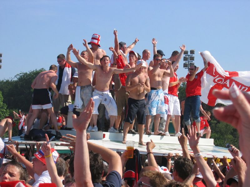 England supporters in national colors before an international football match