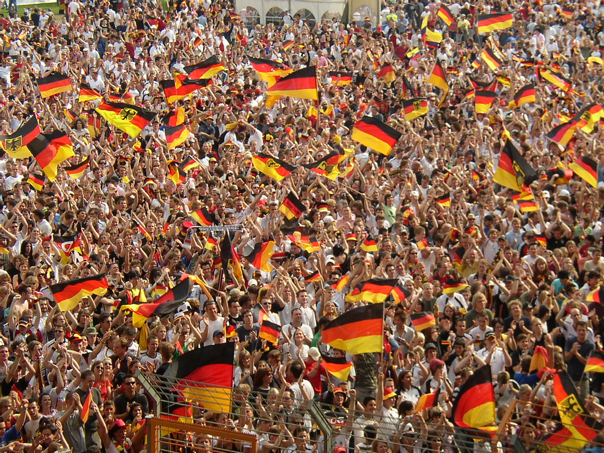 Germany supporters in black, red, and gold before an international match