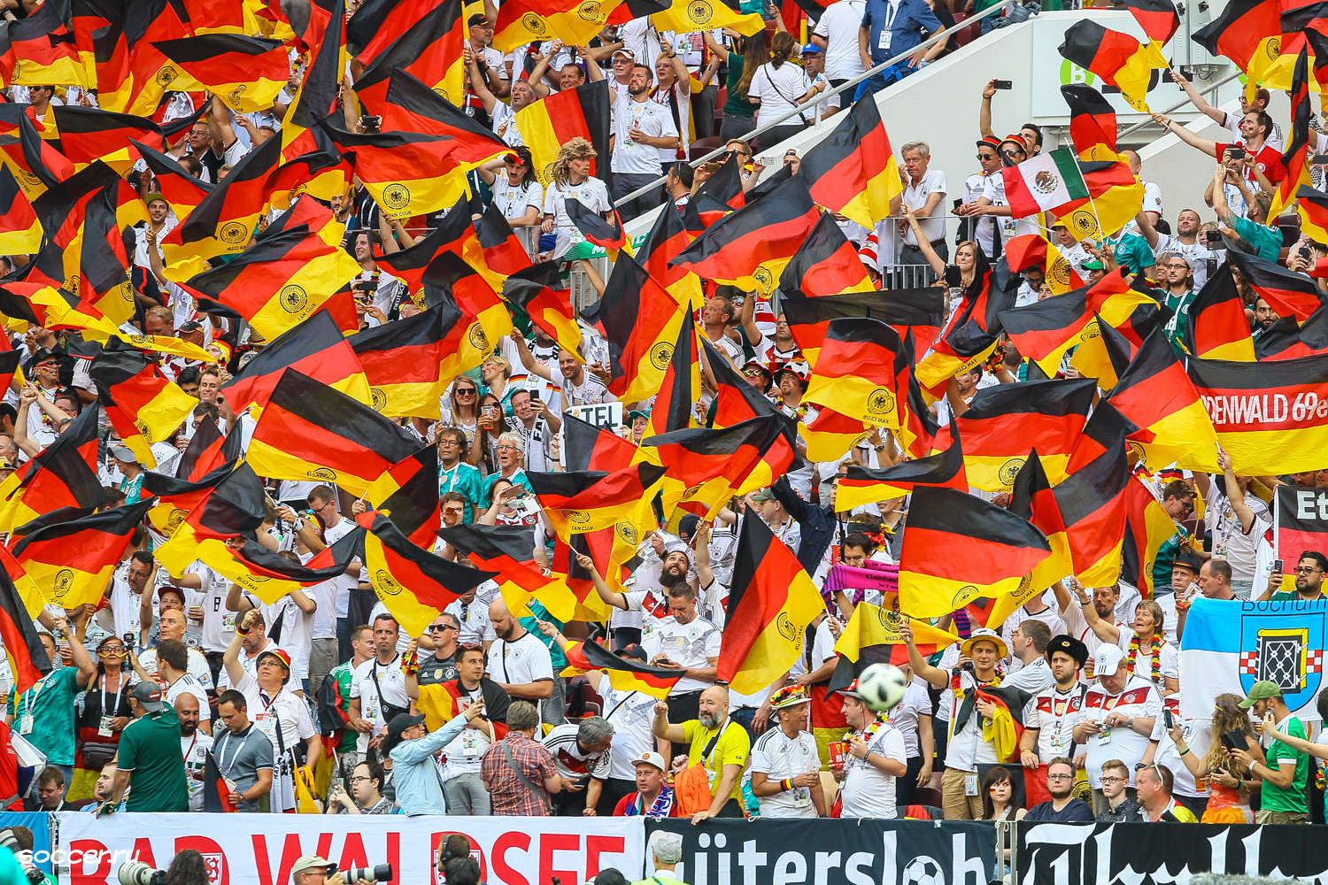 Germany supporters in black, red, and gold at an international match