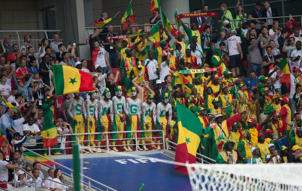 Senegal supporters in green and yellow during a World Cup matchday