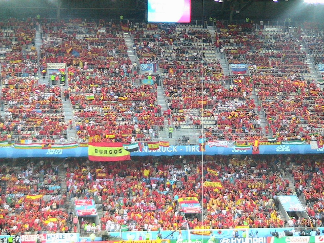 Spain supporters in red and yellow before an international football match